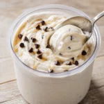 Ninja Creami cottage cheese ice cream scooped from the pint, creamy high protein and made with no pudding mix